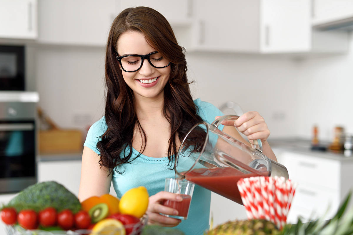 Happy healthy young woman wearing glasses | Why Gut Health Matters More Than You Think