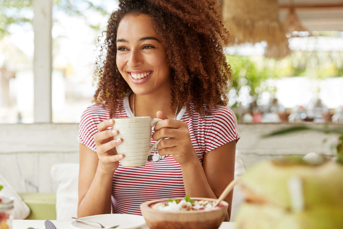 Photo of positive dark skinned mixed race female | The Relations Between Stress, Trauma, And Autoimmune Conditions | stress 