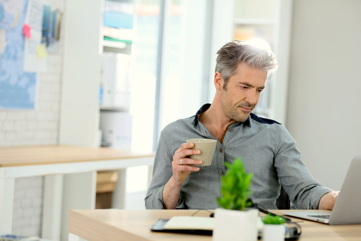 Relaxed man working from home