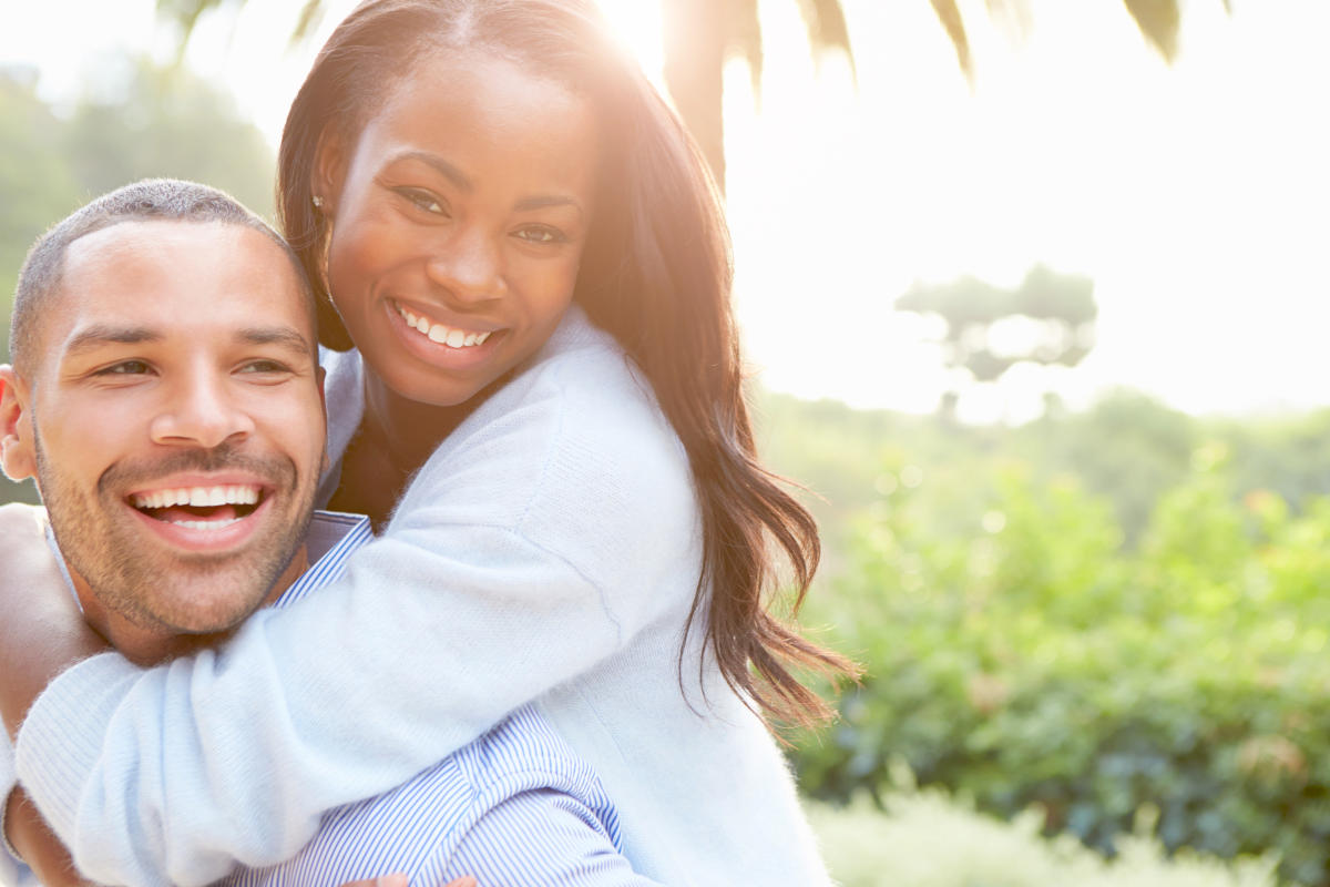Happy African couple | How A Balanced Microbiome Promotes Higher Energy Levels