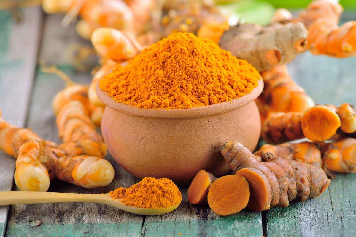 Turmeric roots in the basket on wooden table | Foods To Boost Your Brain Power